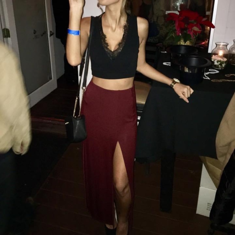 Only been worn once. Burgundy maxi split skirt